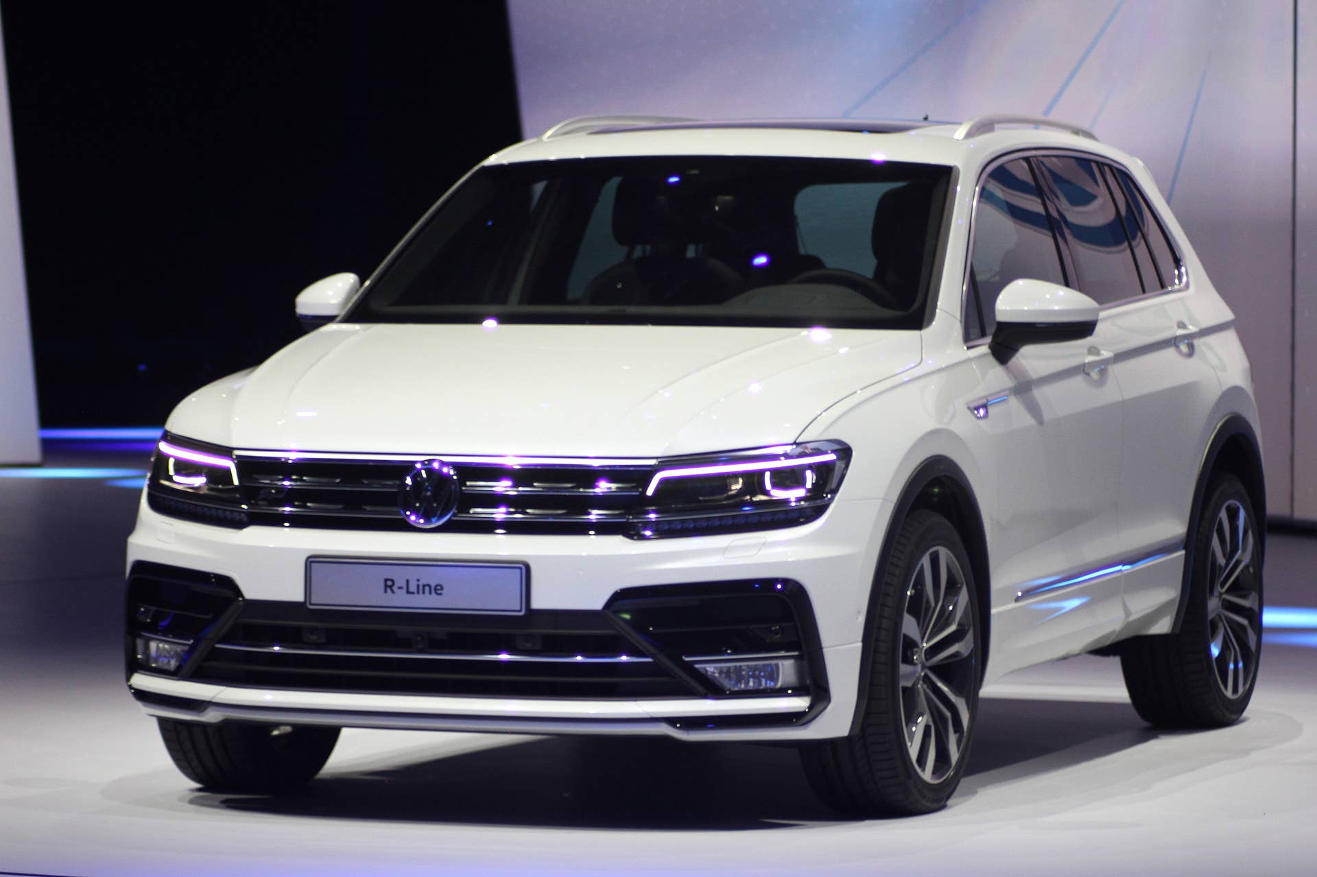 The 2016 Volkswagen Tiguan R-Line, unveiled at Volkswagen's Group Night ahead of the 2015 Frankfurt Motor Show, close-up front three-quarter view.