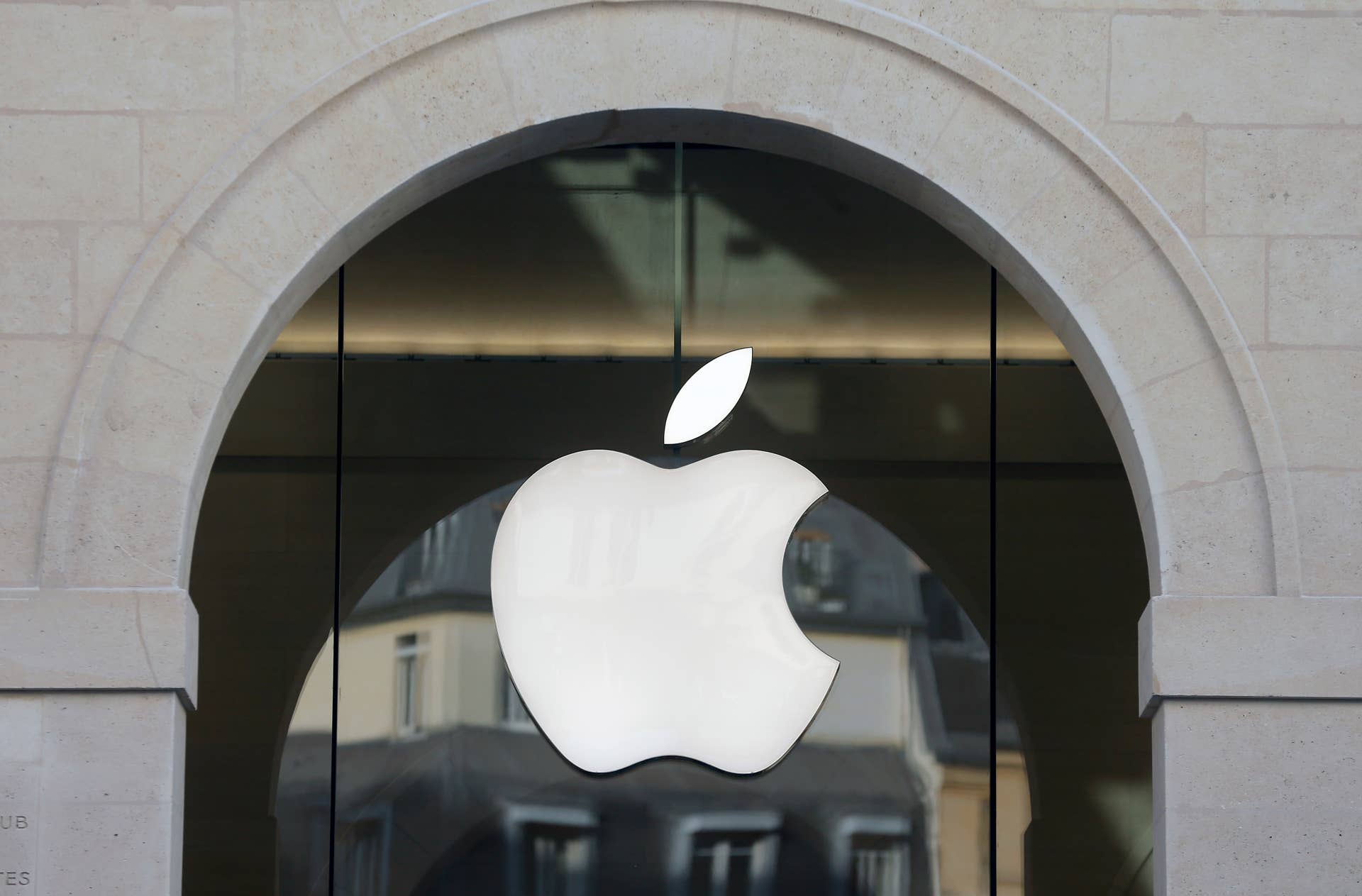 PARIS, FRANCE - DECEMBER 03: The Apple logo is displayed on the facade of the new Apple store Saint-Germain during the first opening day on December 03, 2016 in Paris, France. This store employs 120 people and has an area of 1,300 m2, it is the largest in the capital and it is the first in France to embrace the new design codes chosen by Apple for its shops. Apple store Marche Saint-Germain is the third store in Paris, the 20th in France and the 110th in Europe andÃwill beÃthe 489th in the world. (Photo by Chesnot/Getty Images)