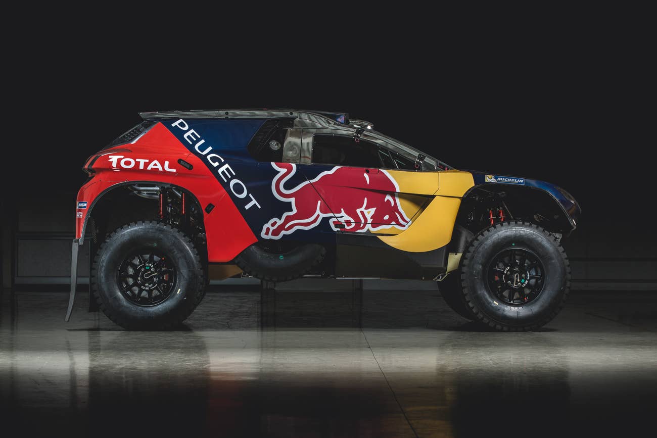 The Peugeot 2008 DKR for the 2016 Dakar Rally, side view.