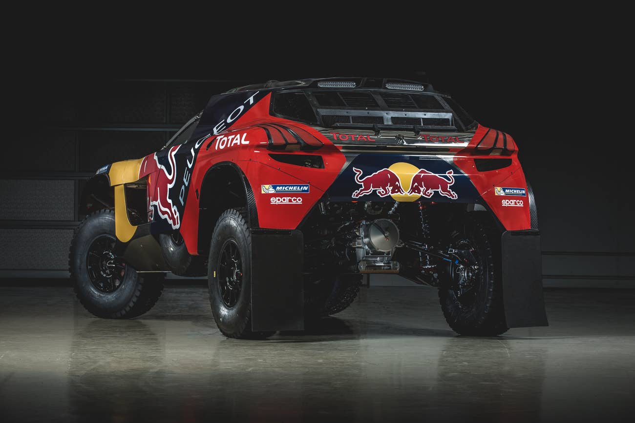The Peugeot 2008 DKR for the 2016 Dakar Rally, rear three-quarter view.