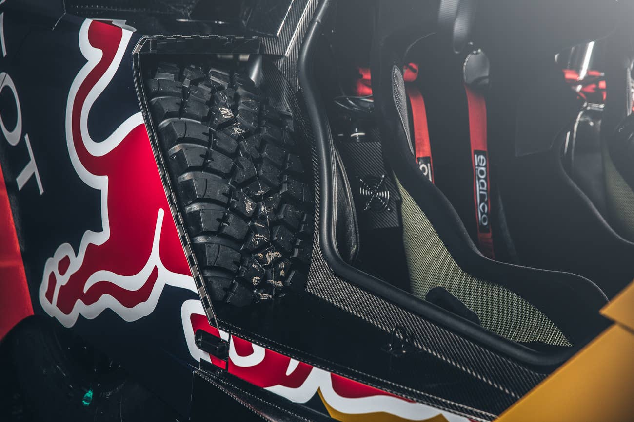 The Peugeot 2008 DKR for the 2016 Dakar Rally, rear wheel and interior.