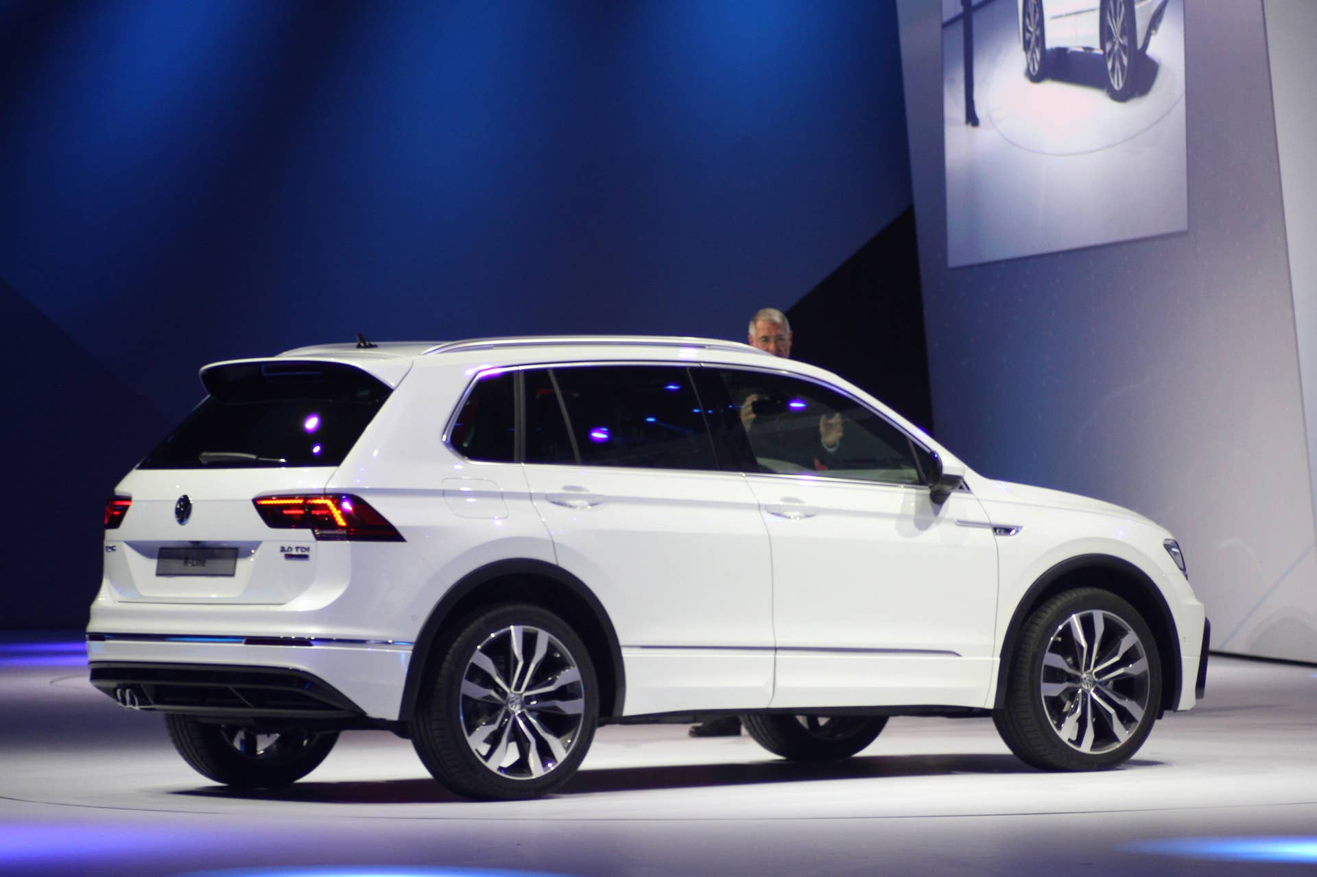 The 2016 Volkswagen Tiguan R-Line, unveiled at Volkswagen's Group Night ahead of the 2015 Frankfurt Motor Show, rear three-quarter.