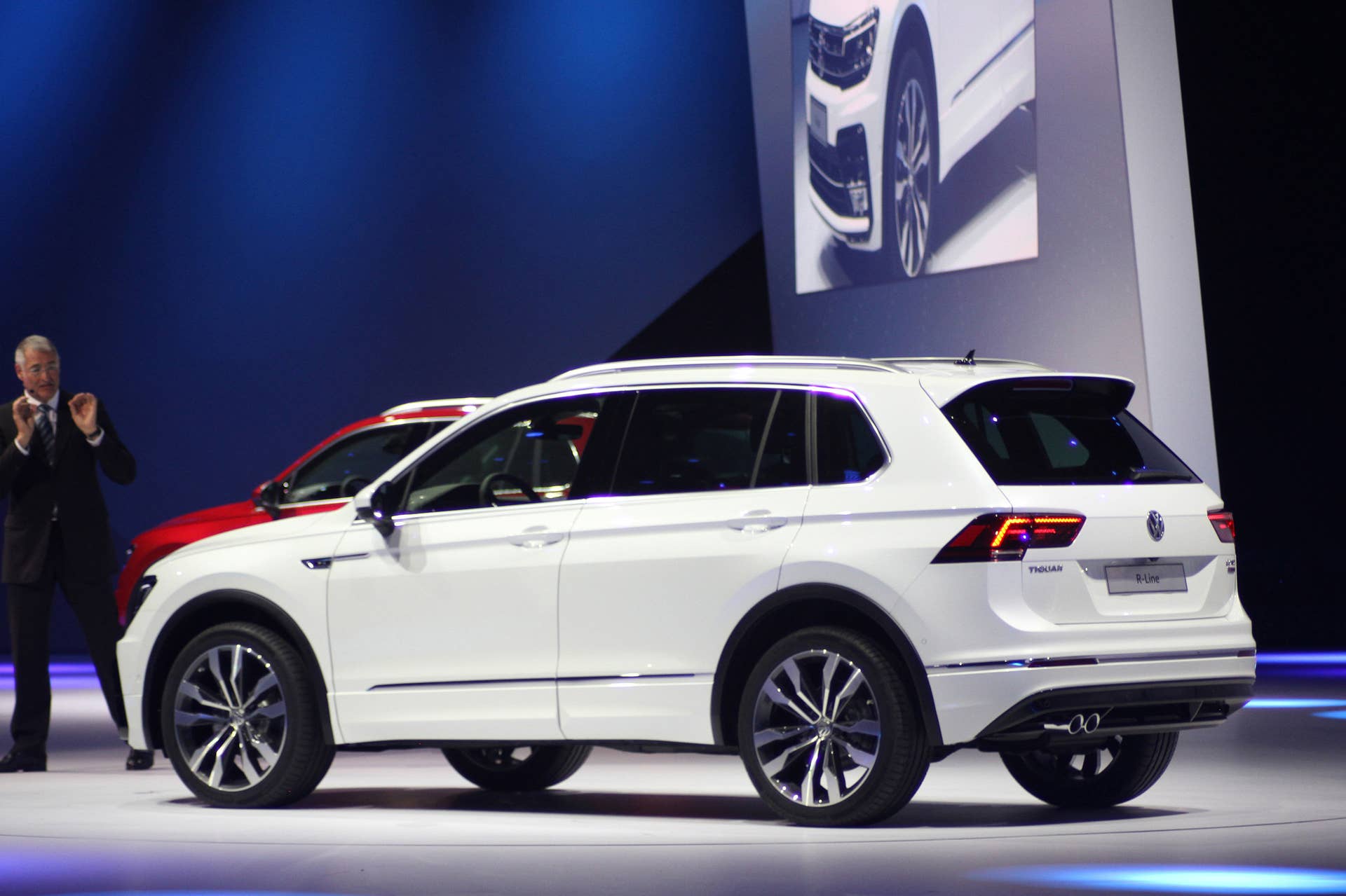 The 2016 Volkswagen Tiguan R-Line, unveiled at Volkswagen's Group Night ahead of the 2015 Frankfurt Motor Show, rear three-quarter.