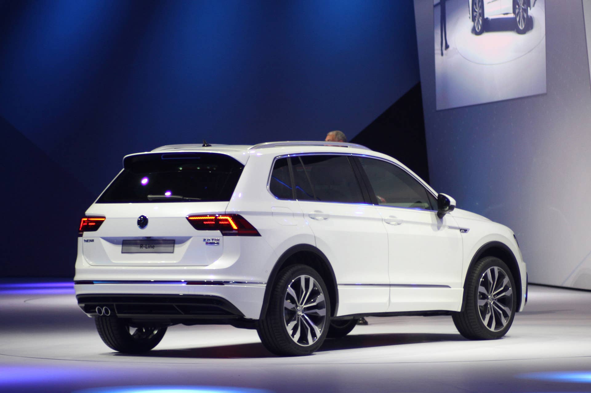 The 2016 Volkswagen Tiguan R-Line, unveiled at Volkswagen's Group Night ahead of the 2015 Frankfurt Motor Show, rear three-quarter view.