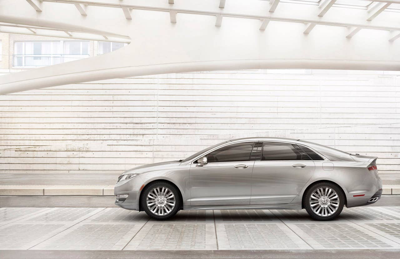 2013 Lincoln MKZ: The 2013 Lincoln MKZ offers Lincoln Drive Control as standard. Lincoln Drive Control is an automatic system that delivers an ideal balance of a smooth ride with confident handling as it intuitively responds to the driver's commands and the road itself.