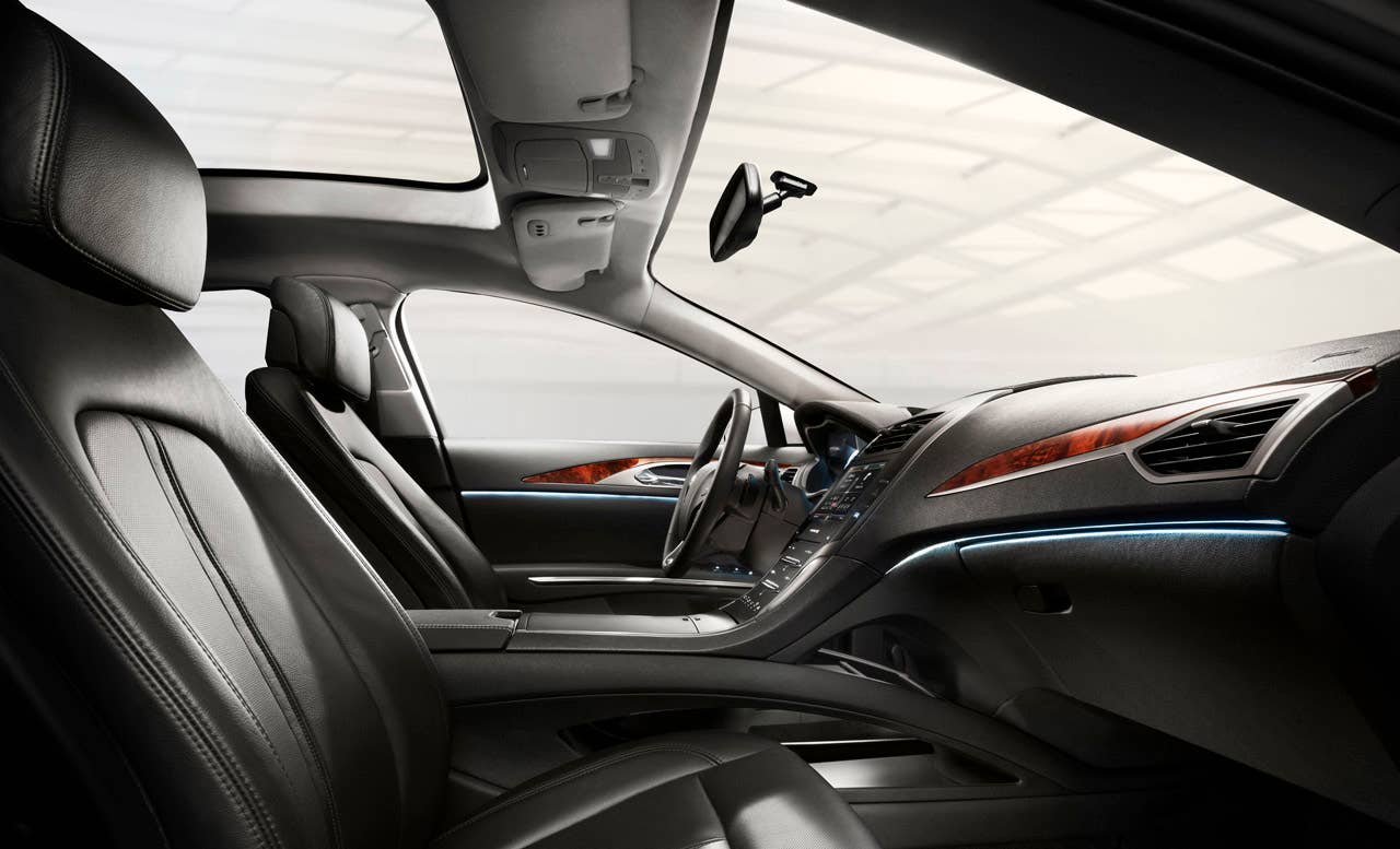 2013 Lincoln MKZ: Design teams created an approachable exterior that invites drivers inside to an airy and warm environment composed of bold architectural elements, rich natural materials and many fine details in the 2013 Lincoln MKZ.