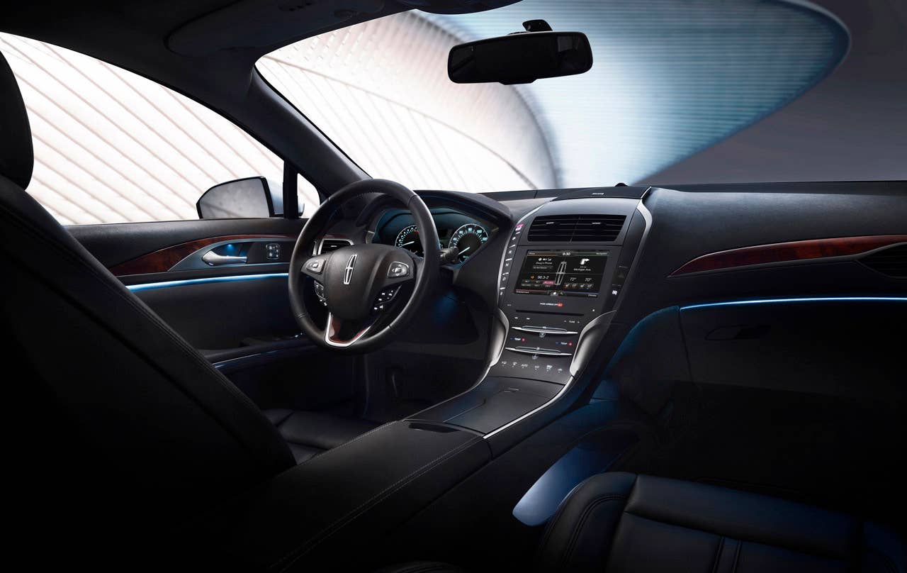 2013 Lincoln MKZ: Design teams created an approachable exterior that invites drivers inside to an airy and warm environment composed of bold architectural elements, rich natural materials and many fine details in the 2013 Lincoln MKZ.
