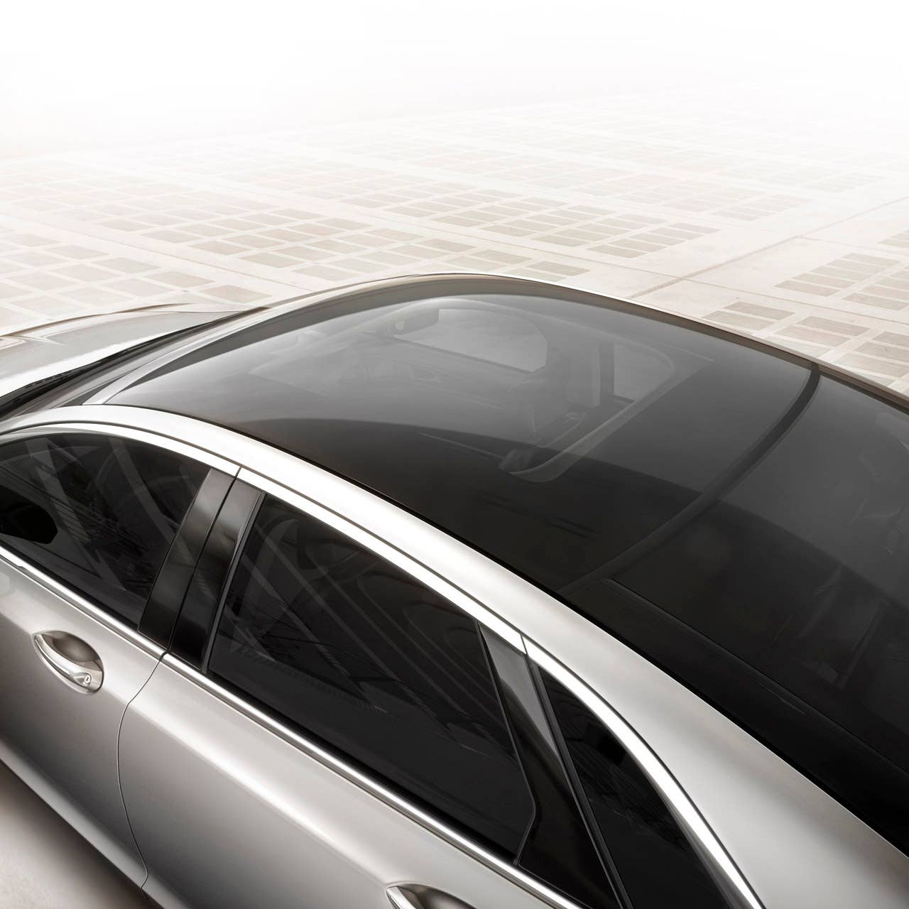 2013 Lincoln MKZ: The sweeping profile of the 2013 Lincoln MKZ incorporates one of the world's widest-opening retractable glass roofs.