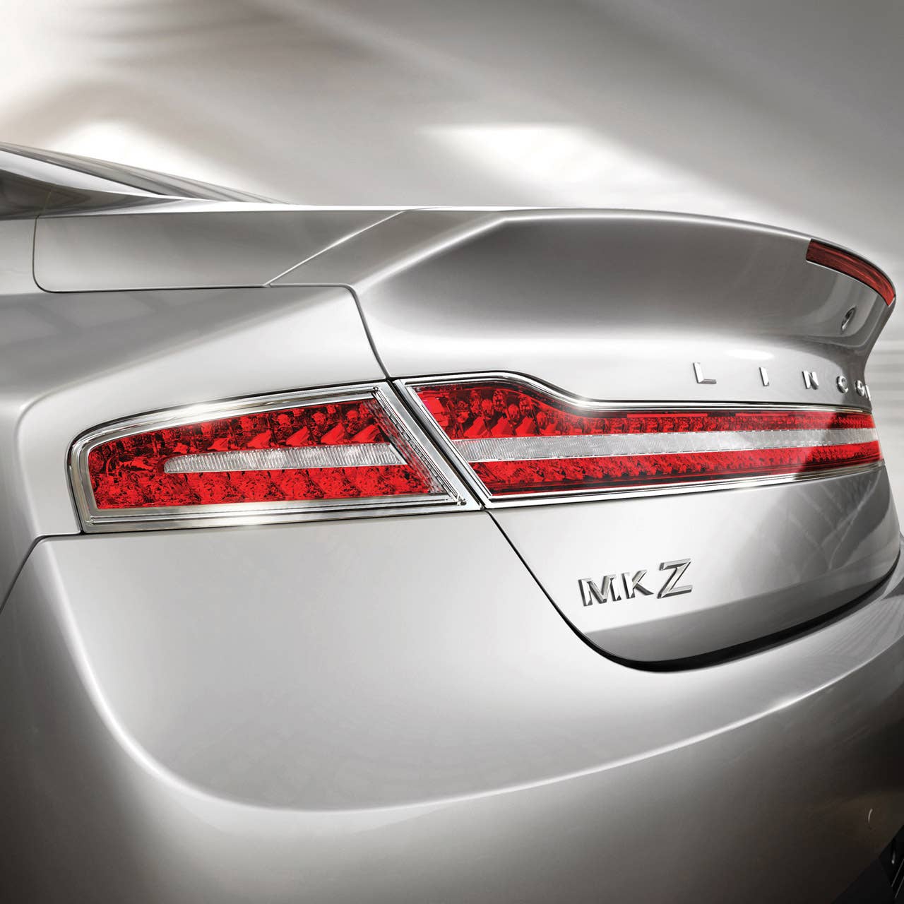 2013 Lincoln MKZ: LED technology enabled an extremely thin and distinctive full-width taillamp graphic on the 2013 Lincoln MKZ.