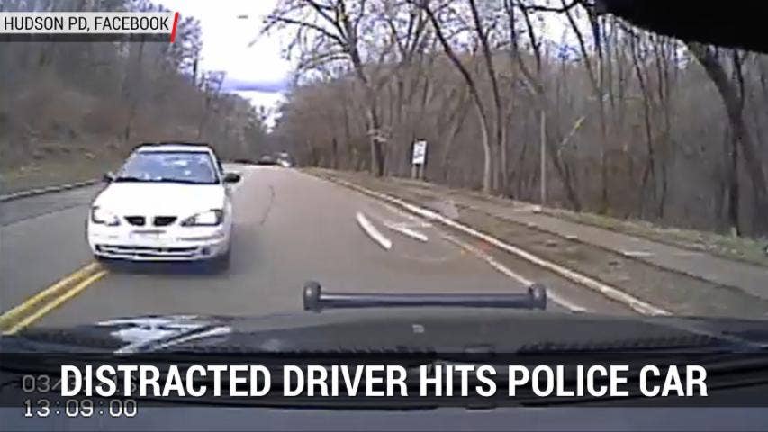 Distracted Driver Hits Police Car | Autoblog Minute
