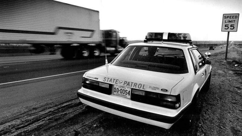 MAR 19 1987; Trooper Dave Lohf with the state patrol in his patrol car on north I25, north of 120th