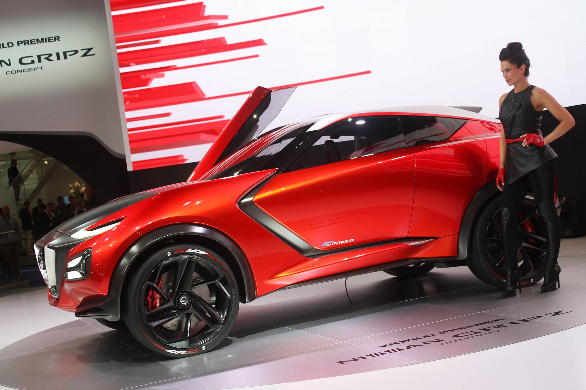 The Nissan Gripz concept unveiled at the 2015 Frankfurt Motor Show, side view with model.