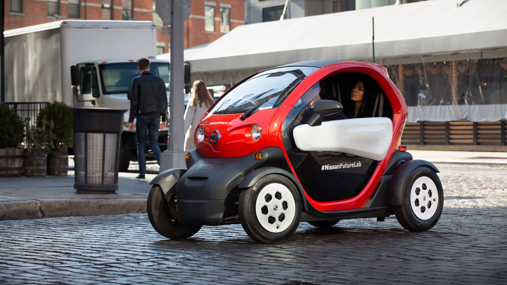 The Nissan New Mobility Concept is an ultra-compact 100% electric vehicle that was developed in response to increasing use of automobiles for short-distance trips by up to two people. With their 7.6-foot length, the NNMCs have the potential to help reduce pollution and traffic congestion in the city. Parking is also a major benefit, with three NNMCs able to fit head-in into one parking space (where permitted). For demonstration purposes during the 2016 NYIAS, the four concepts were wrapped in different primary colors with the hashtag #NissanFutureLab down the sides.