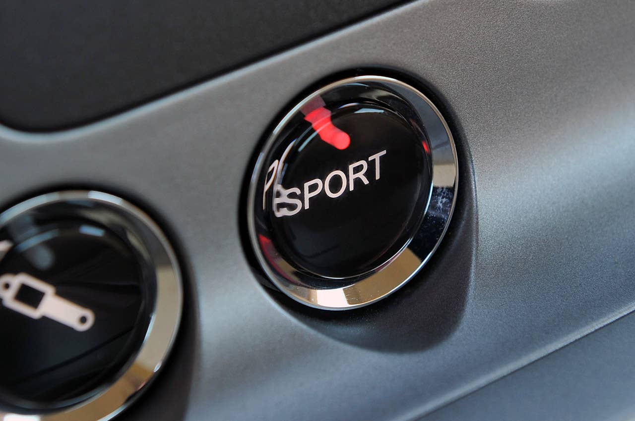 2013 Aston Martin DB9 sport mode button