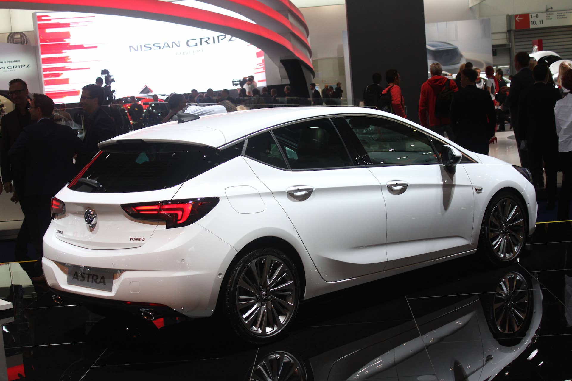 The new 2016 Opel Astra at the Frankfurt Motor Show, rear three-quarter view.