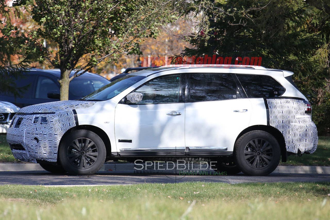 white 2017 nissan pathfinder spy shot side
