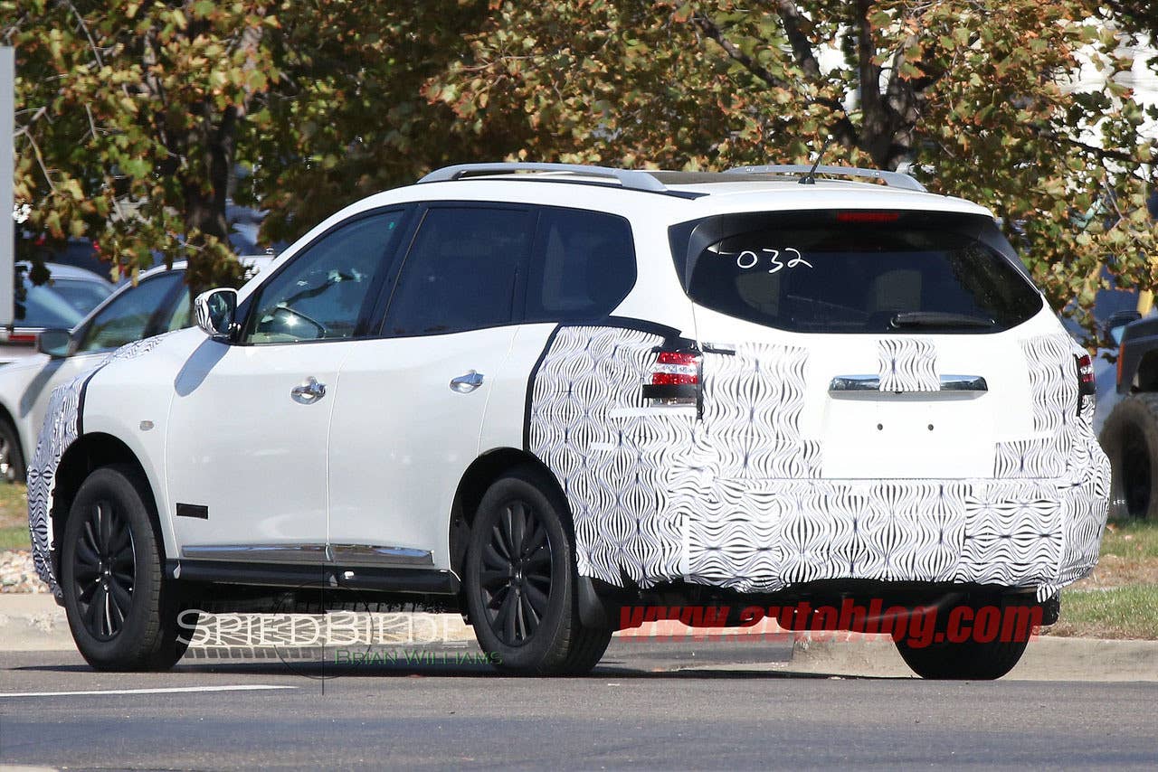 white 2017 nissan pathfinder spy shot rear three quarters camouflage