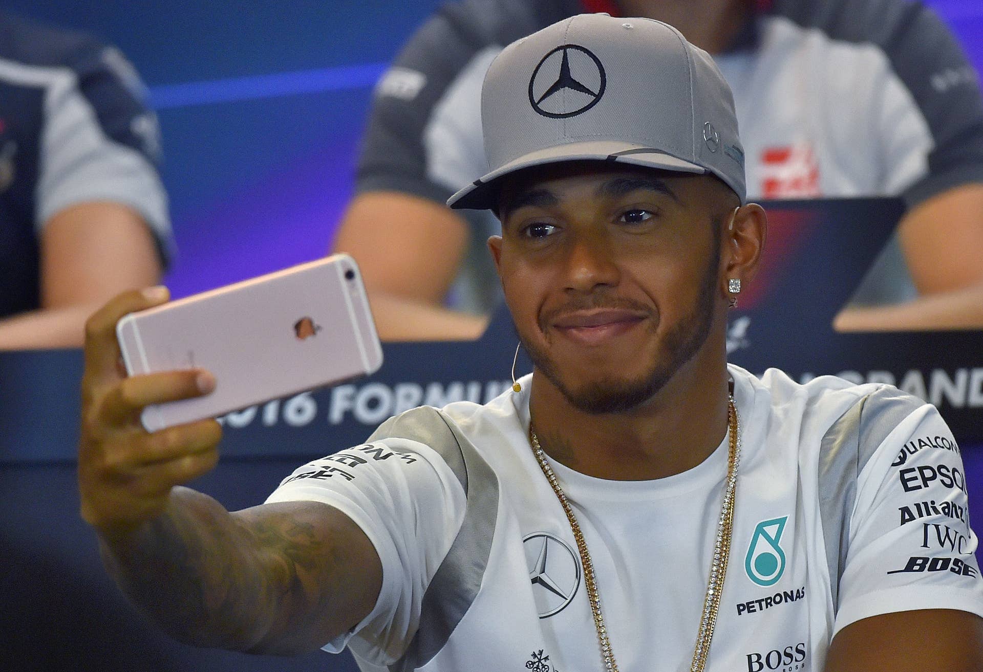 Mercedes AMG Petronas' British driver Lewis Hamilton takes a selfie picture with his mobile phone during a press conference ahead of the Formula One Grand Prix of Belgium at the Spa-Francorchamps circuit on August 25, 2016. / AFP / LOIC VENANCE (Photo credit should read LOIC VENANCE/AFP/Getty Images)