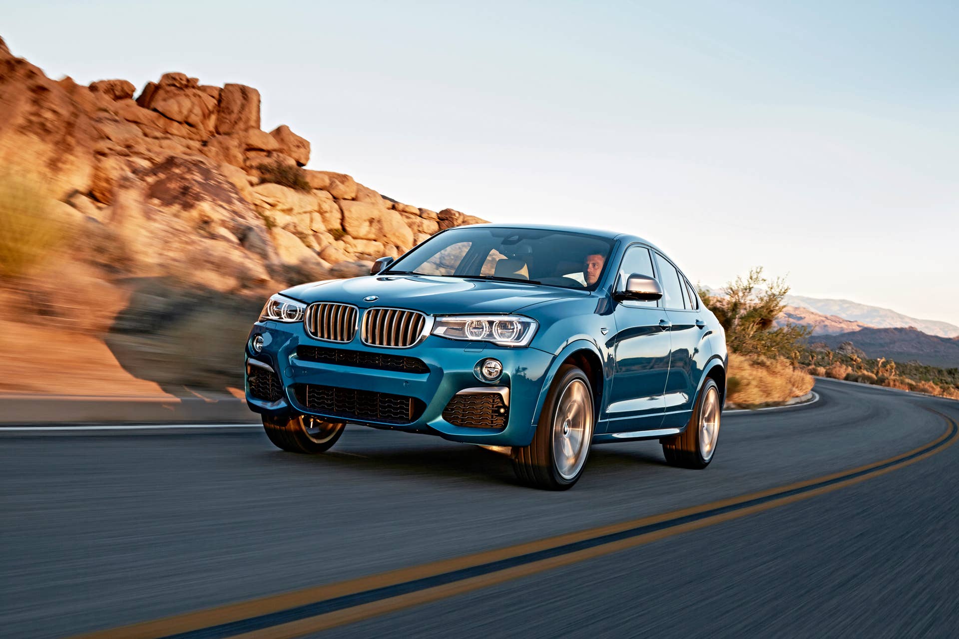 BMW X4 M40i front 3/4 road
