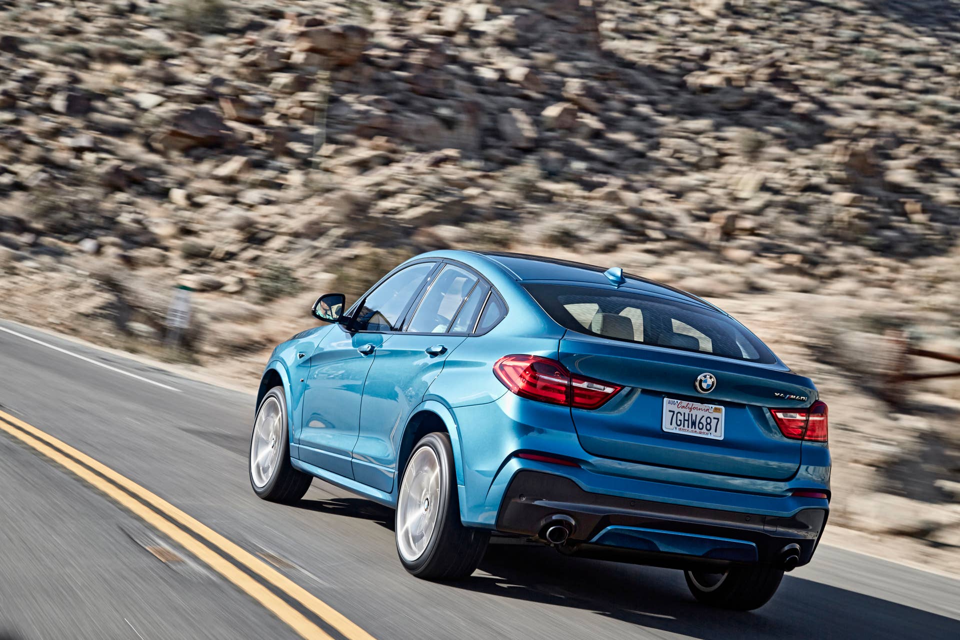 BMW X4 M40i rear 3/4 driving