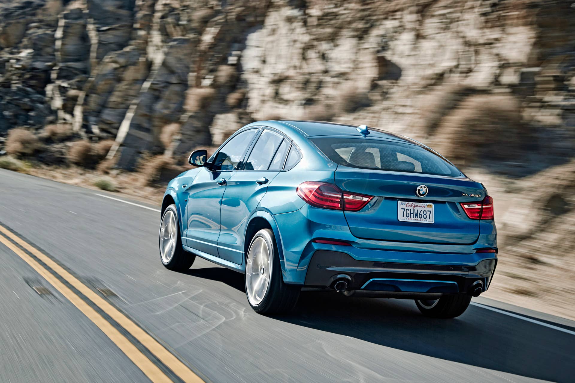 BMW X4 M40i rear 3/4 road