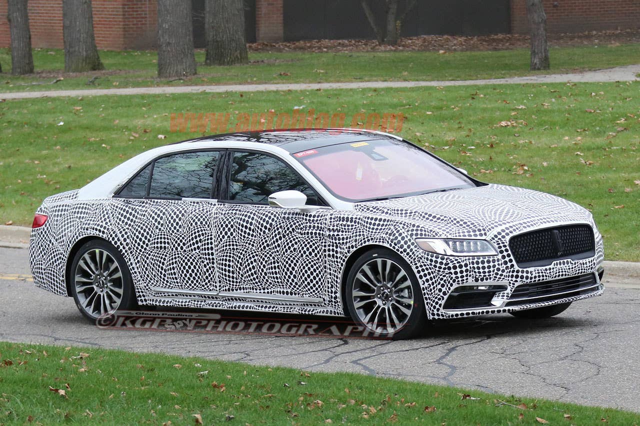lincoln continental spy shot three quarters grass
