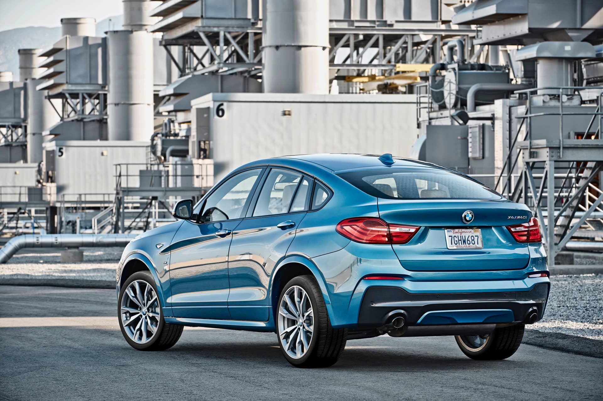 BMW X4 M40i rear 3/4 static industrial