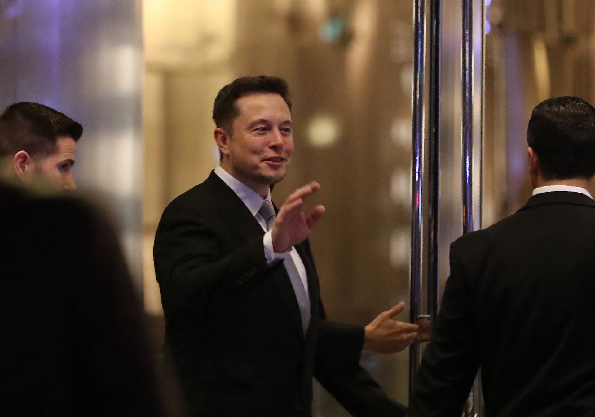 Elon Musk, the co-founder and chief executive of Electric carmaker Tesla, gestures during a ceremony in Dubai on February 13, 2017. Tesla announced the opening of a new Gulf headquarters in Dubai, aiming to conquer an oil-rich region better known for gas guzzlers than environmentally friendly motoring. / AFP / KARIM SAHIB (Photo credit should read KARIM SAHIB/AFP/Getty Images)