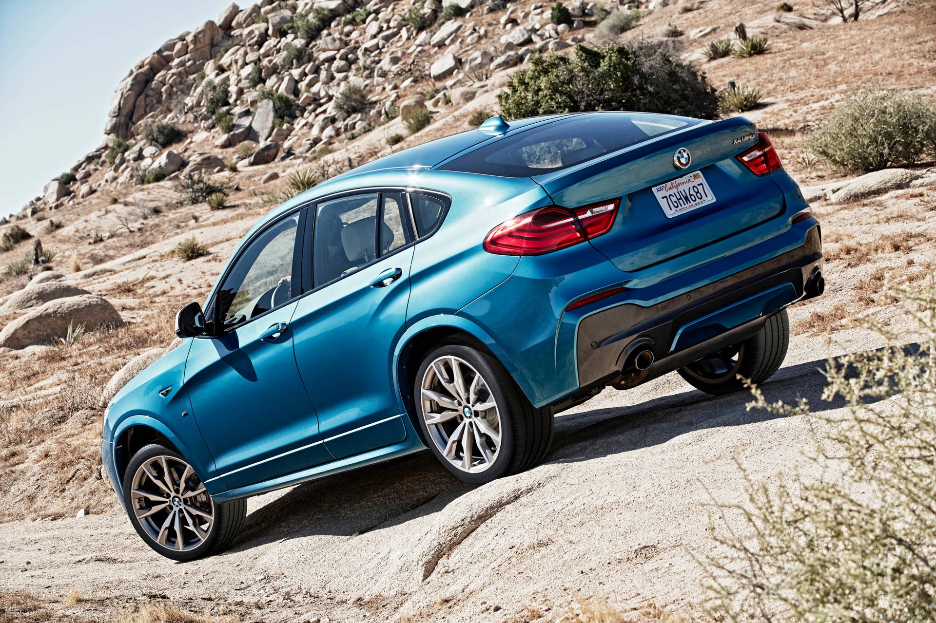 BMW X4 M40i rear 3/4 off-road nature