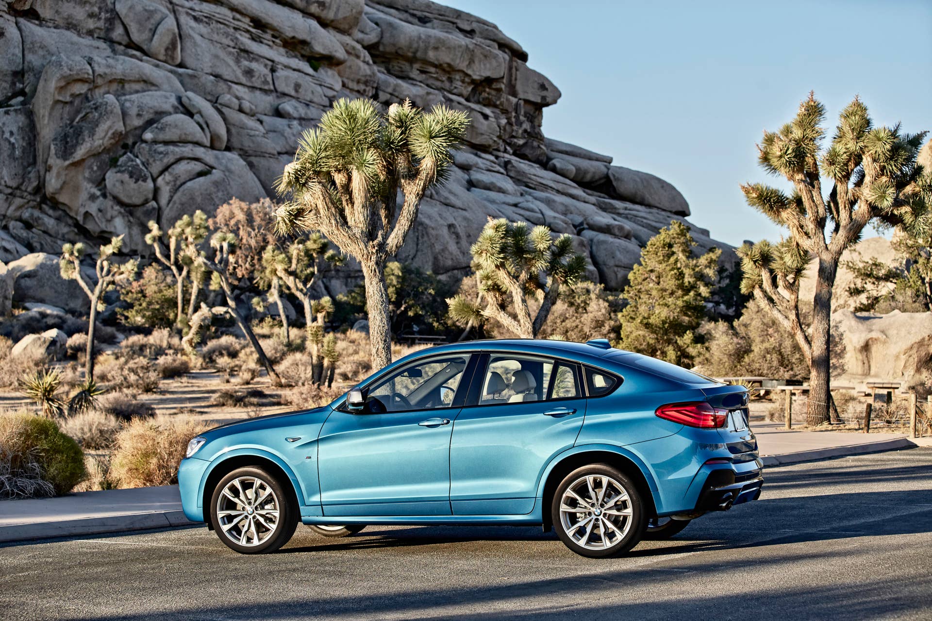 BMW X4 M40i rear 3/4 static road
