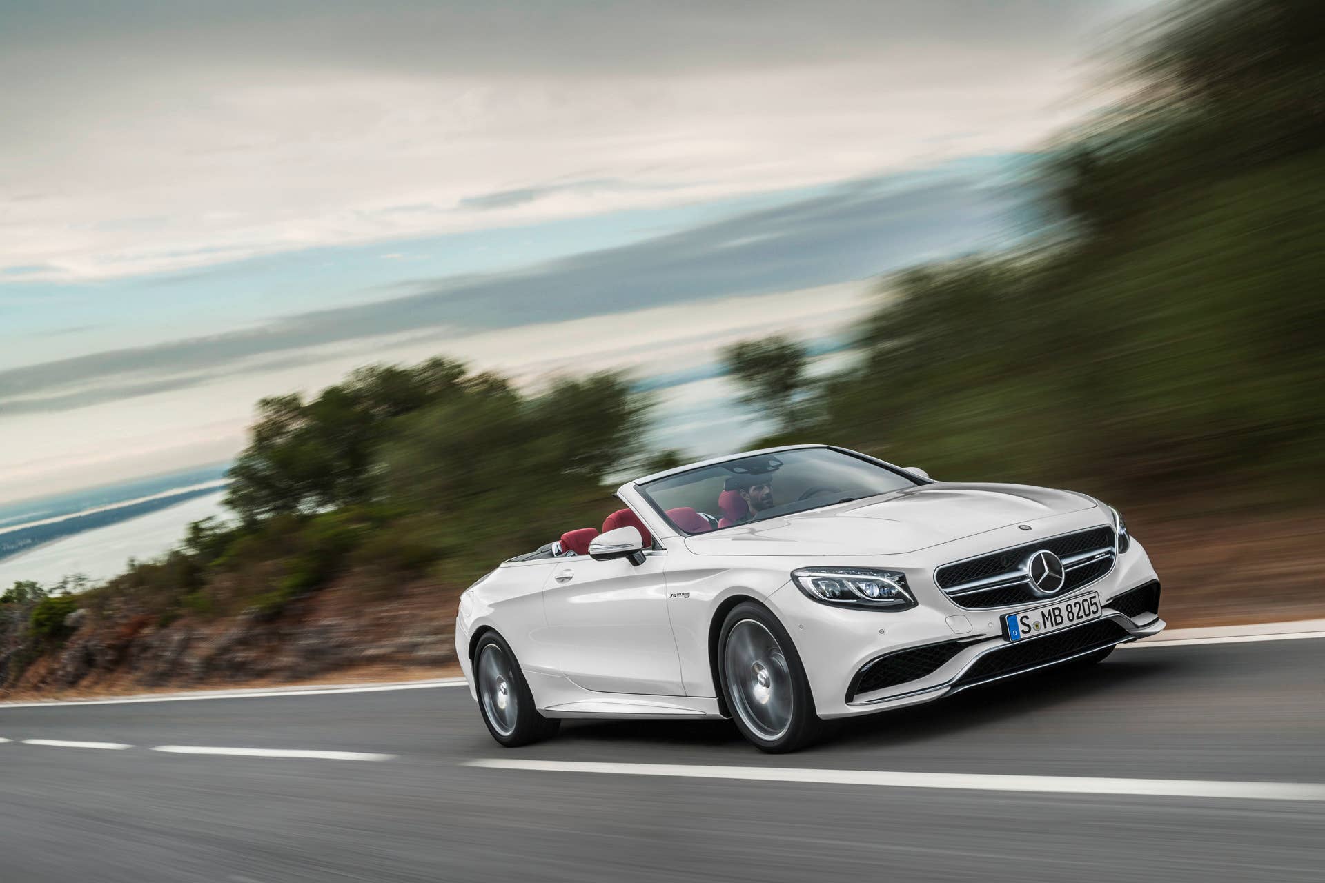 speed action s63 amg mercedes cabriolet top down