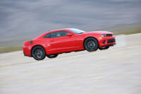 At the 2014 SEMA Show, Chevrolet demonstrated how owners of fifth-generation Camaro models (2010-15) can enhance their cars’ performance with factory-engineered components from the 1LE and Z/28. Chevrolet tested three stages of Camaro performance at GM’s Milford Road Course; the stock Camaro SS (shown here) turned a 2:05.10 lap; the Ultimate Street Camaro SS concept, featuring components from the Camaro 1LE, turned a 1:59.30; and the Ultimate Track Camaro SS concept, featuring components from the Camaro Z/28, turned a 1:56.43.
