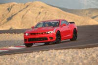 At the 2014 SEMA Show, Chevrolet demonstrated how owners of fifth-generation Camaro models (2010-15) can enhance their cars’ performance with factory-engineered components from the 1LE and Z/28. Chevrolet tested three stages of Camaro performance at GM’s Milford Road Course; the stock Camaro SS turned a 2:05.10 lap; the Ultimate Street Camaro SS concept, featuring components from the Camaro 1LE, turned a 1:59.30; and the Ultimate Track Camaro SS concept (shown here), featuring components from the Camaro Z/28, turned a 1:56.43.