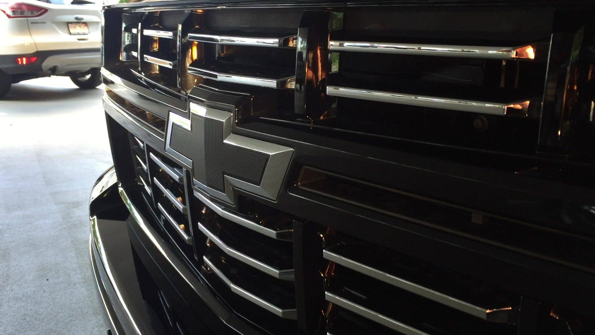 We were surprised and delighted when we found out the black bowtie on the Chevy Silverado Midnight Edition had a cool party trick.