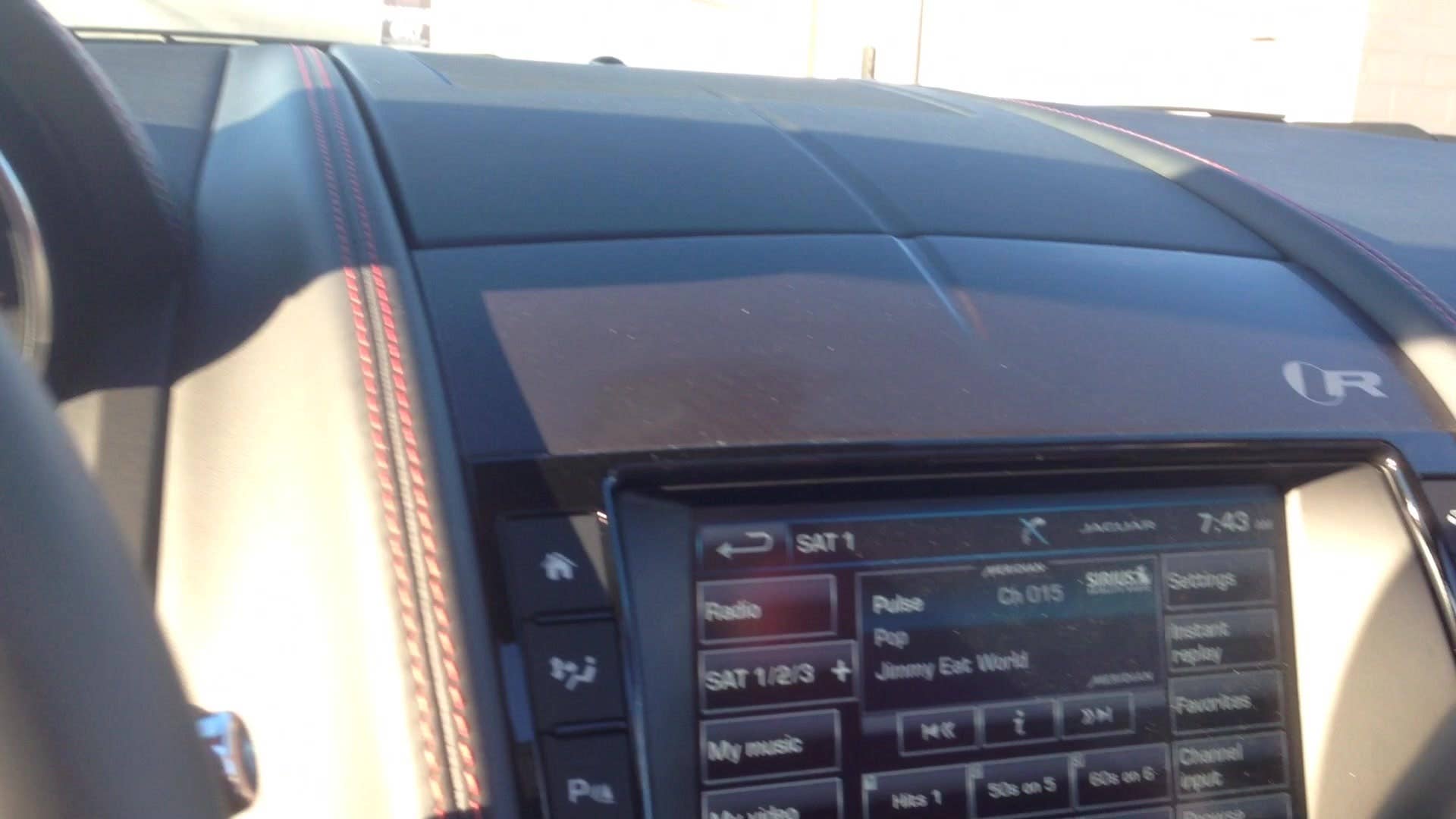 Greg Migliore shows off the interior of the 2016 Jaguar F-Type R convertible.