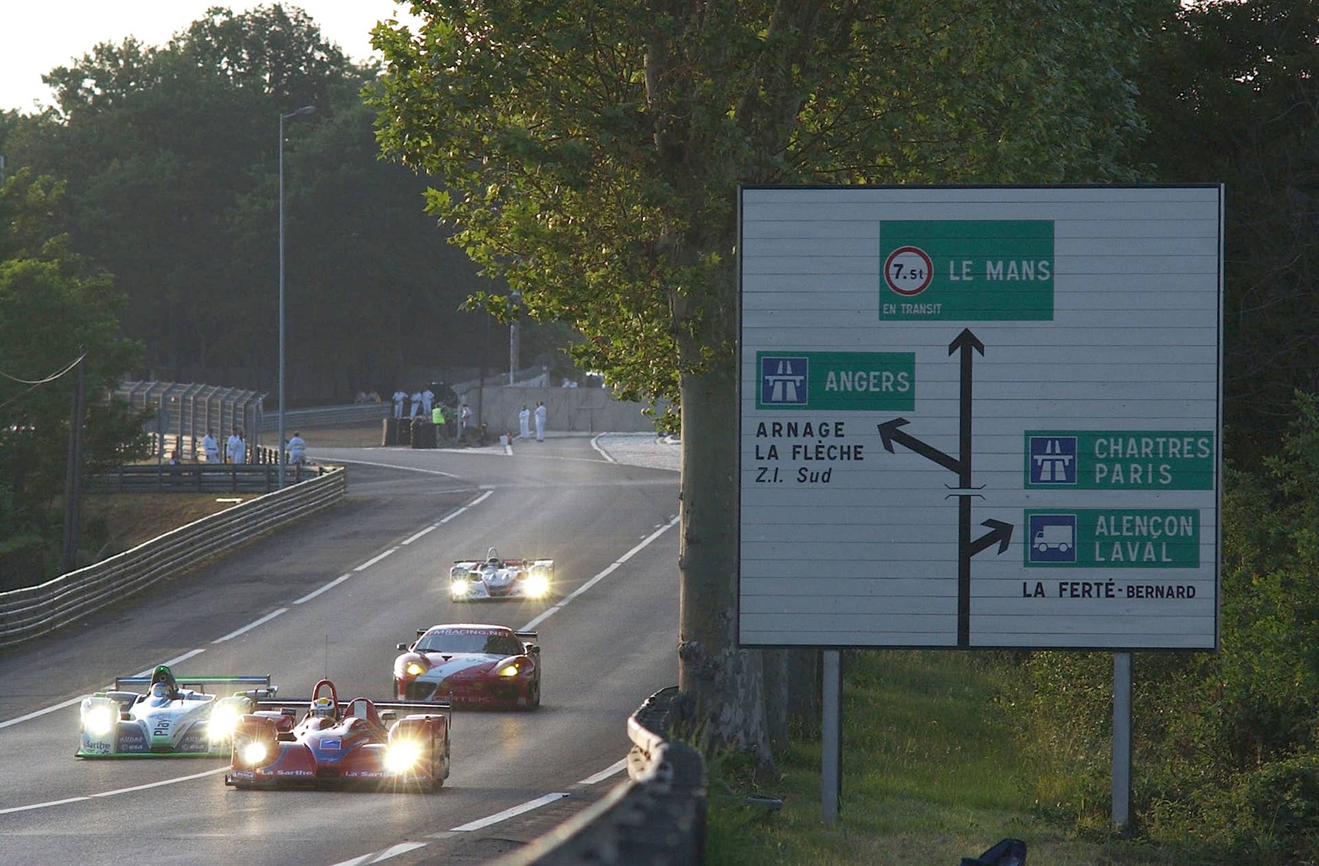 LE MANS, FRANCE - JUNE 10: The Courage Competition leads on the Mulsanne Straight during final qualifying for the Le Mans 24 Hour race on June 10, 2004 at the Circuit des 24 Hours du Mans in Le Mans, France. (Photo by Ker Robertson/Getty Images)
