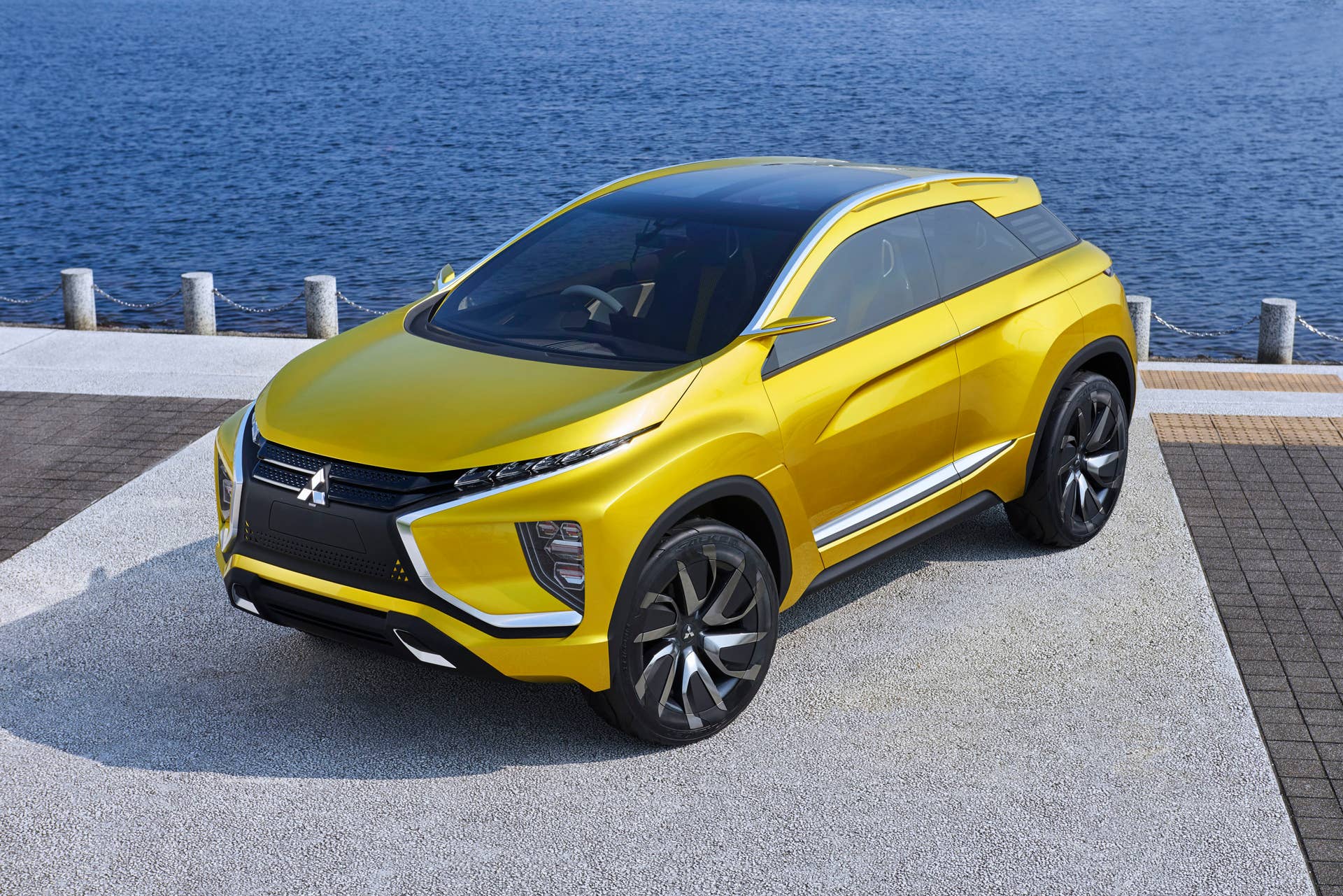yellow mitsubishi ex concept front three quarters top