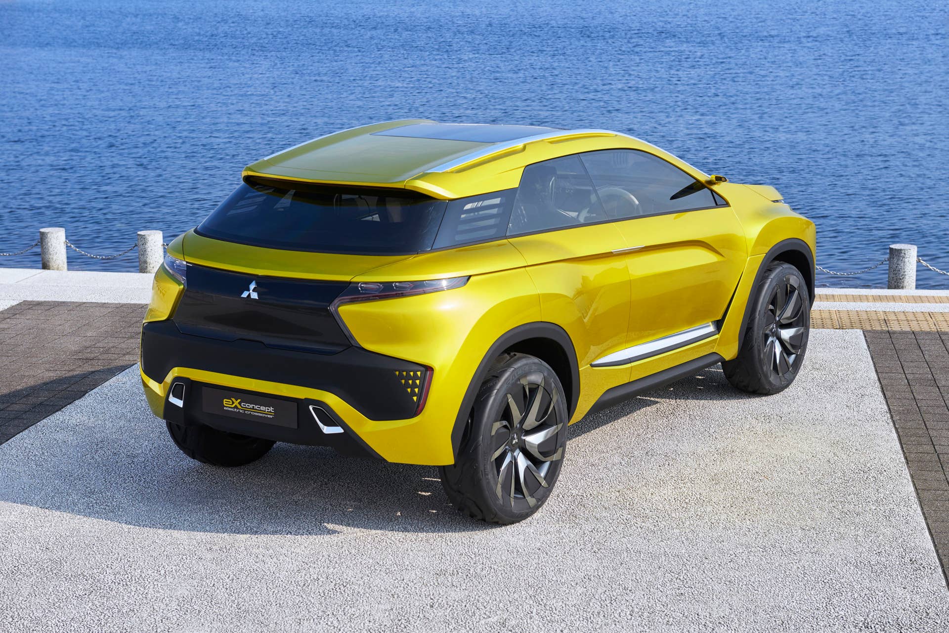 yellow mitsubishi ex concept rear three quarters dock