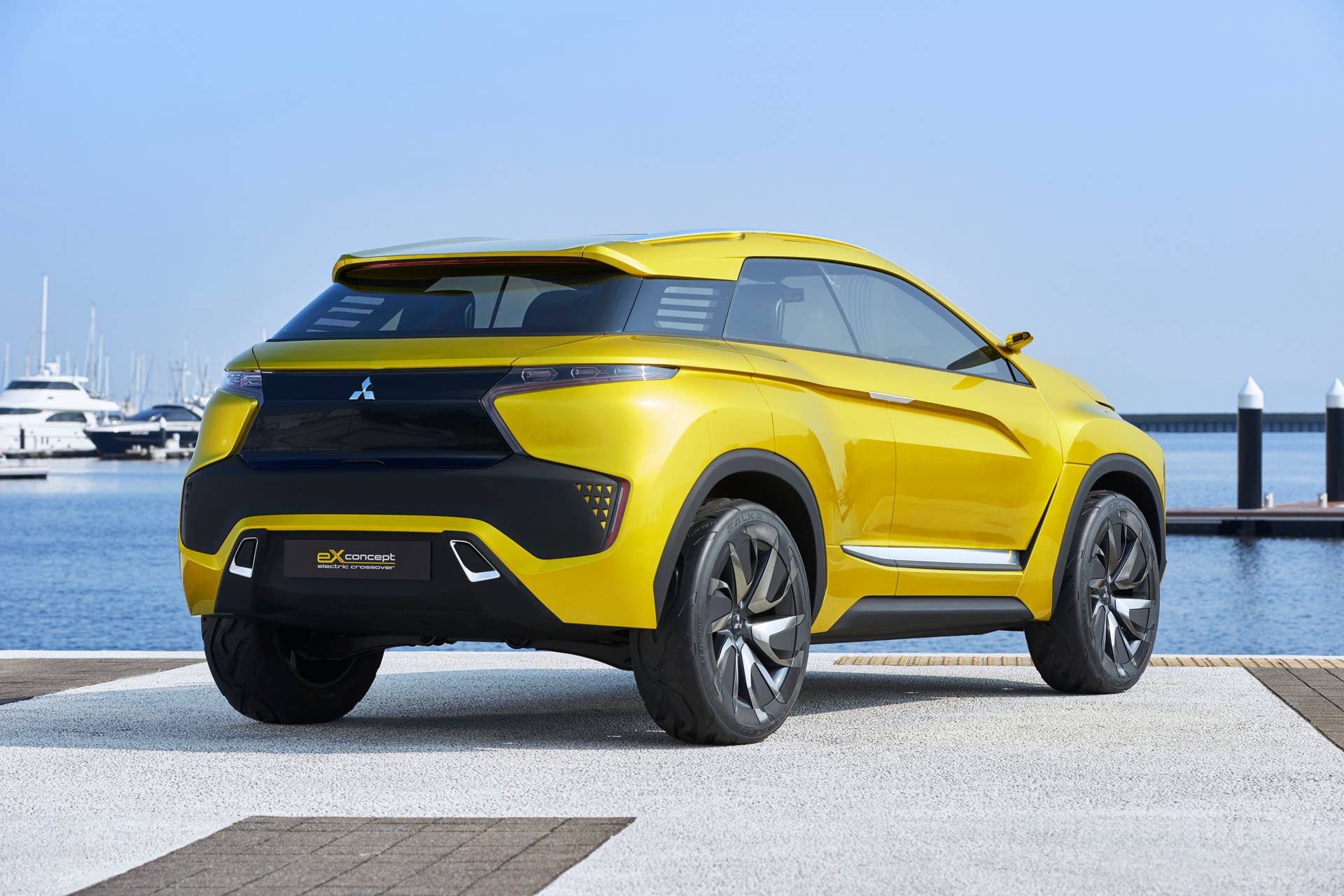 yellow mitsubishi ex concept  rear three quarters boats