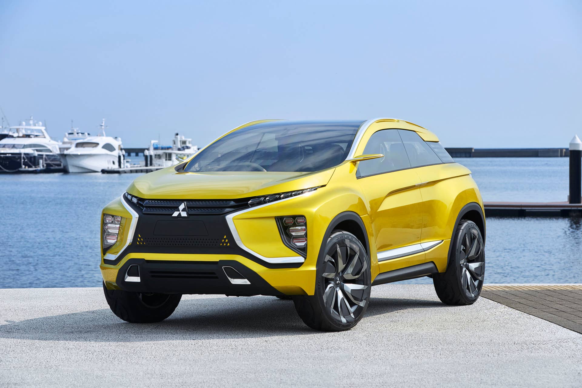 yellow mitsubishi ex concept front three quarters boats
