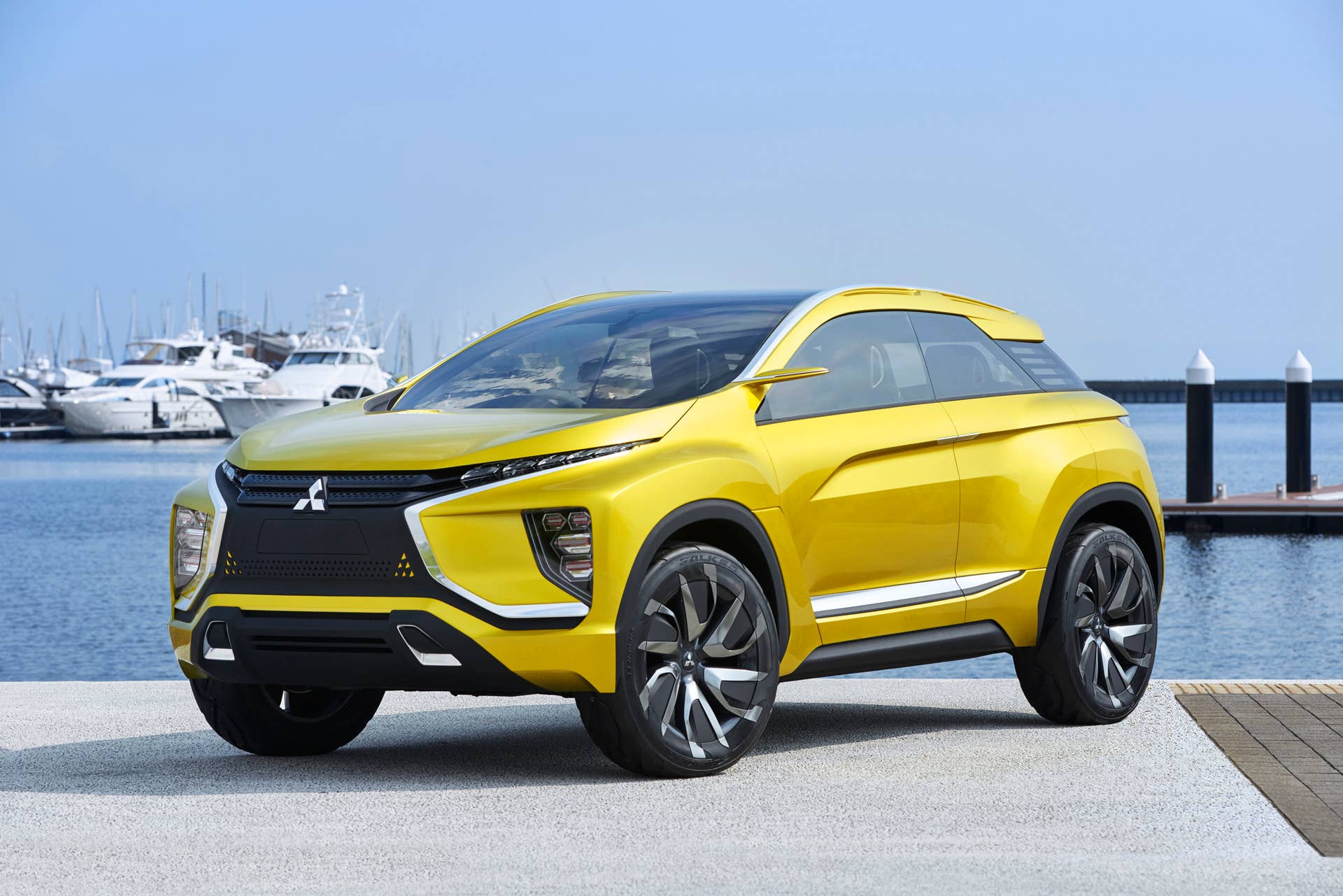 yellow mitsubishi ex concept front three quarters dock