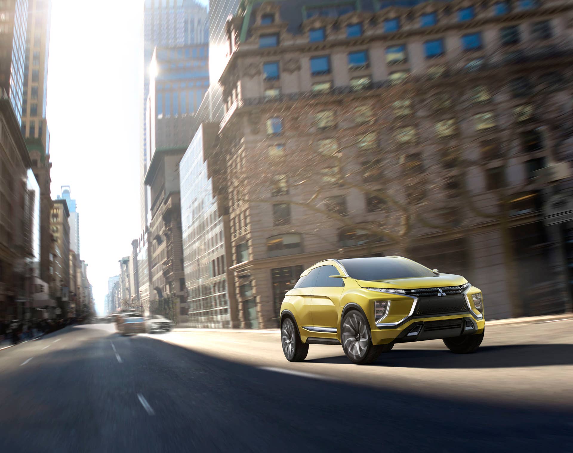 yellow mitsubishi ex concept  in the city