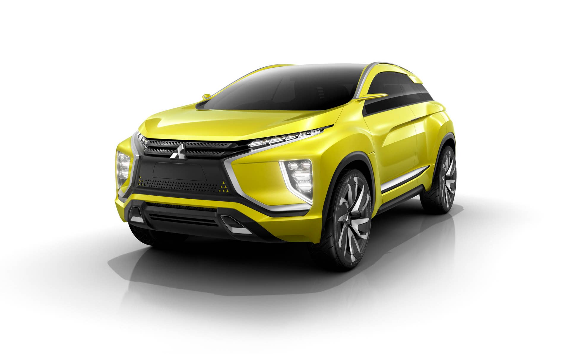 yellow mitsubishi ex concept white background