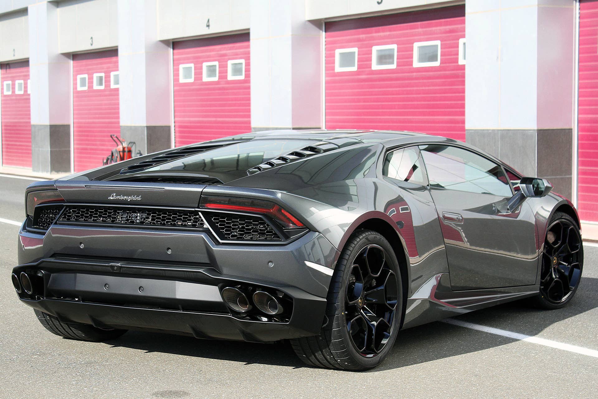 2016 Lamborghini Huracan LP 580-2 rear 3/4 view