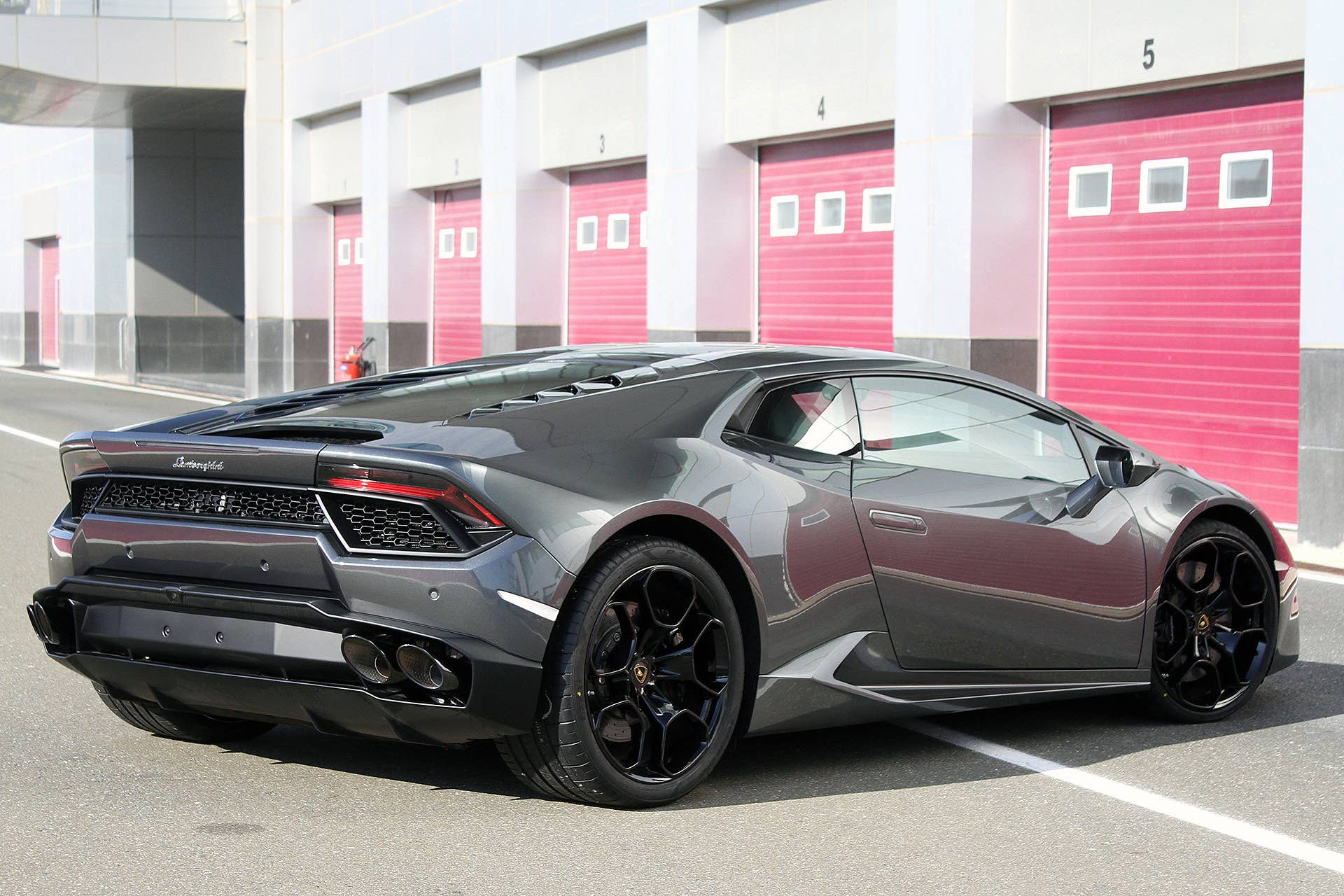 2016 Lamborghini Huracan LP 580-2 rear 3/4 view