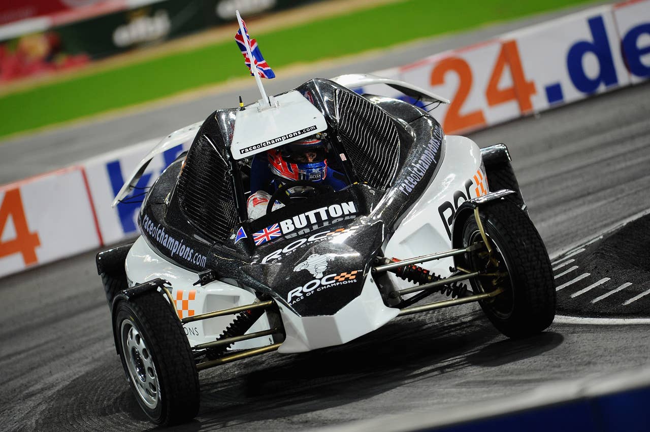 DUESSELDORF, GERMANY - DECEMBER 04:  Jenson Button of Great Britain races during day two of the race of champions event at the Esprit Arena on December 4, 2011 in Duesseldorf, Germany.  (Photo by Dennis Grombkowski/Bongarts/Getty Images)