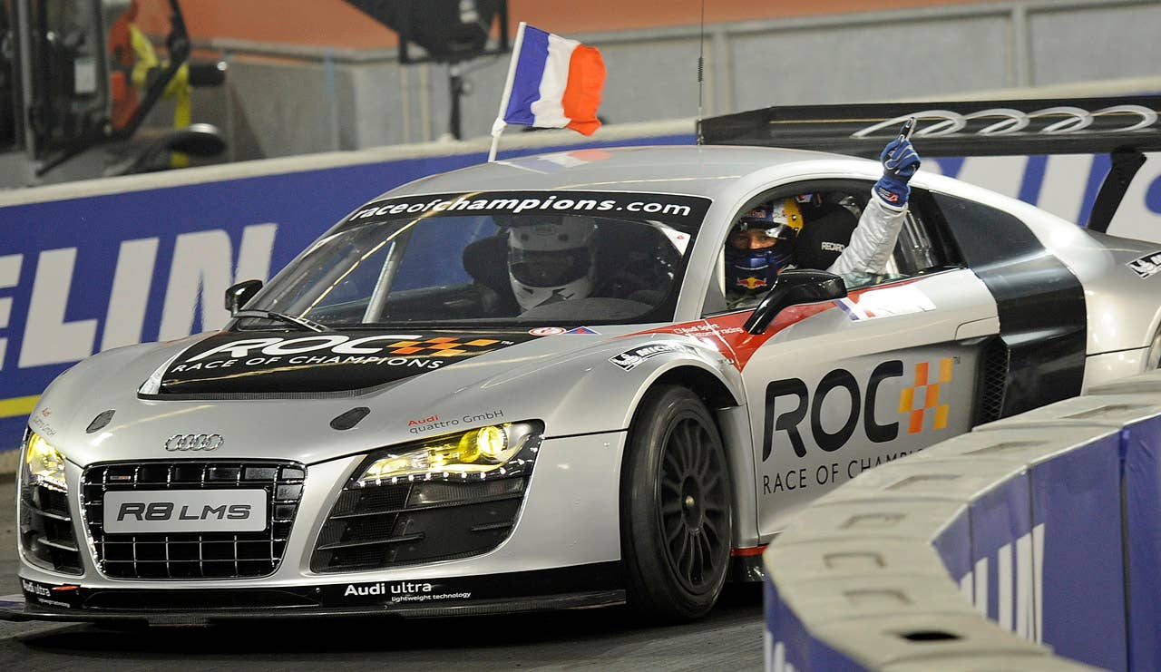 France's Sebastien Ogier celebrates in his car after winning the final of the Race of Champions at the arena in Duesseldorf, western Germany, Sunday, Dec. 4, 2011. (AP Photo/Martin Meissner)