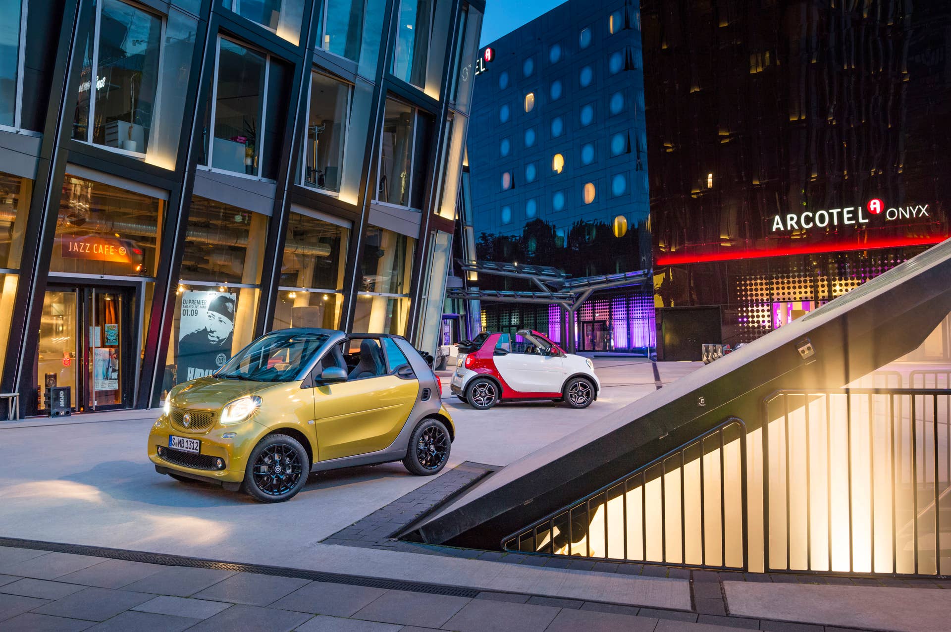 The 2016 Smart Fortwo Cabriolet, front three-quarter static, two models.