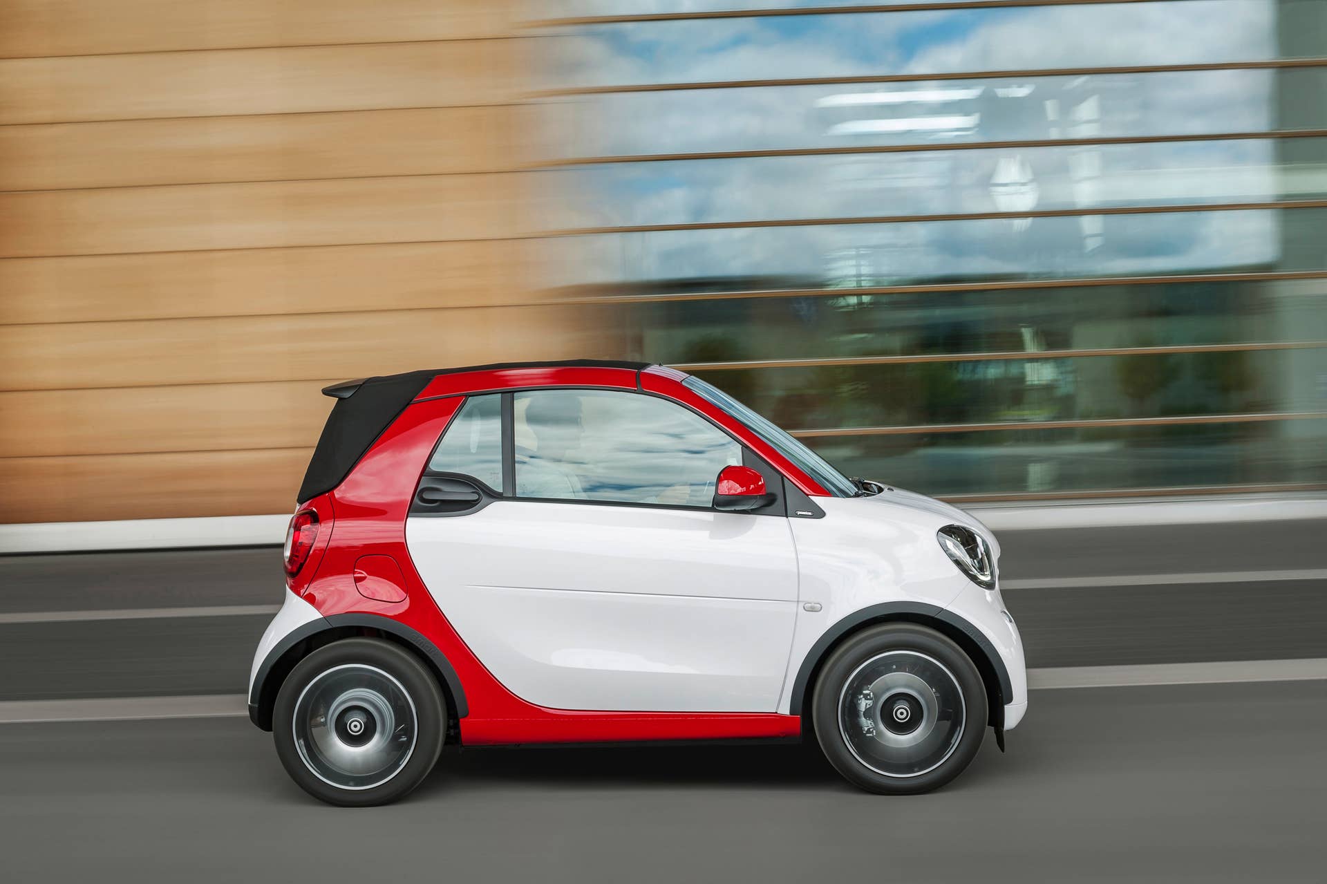 The 2016 Smart Fortwo Cabriolet, passion trim, side view top up.