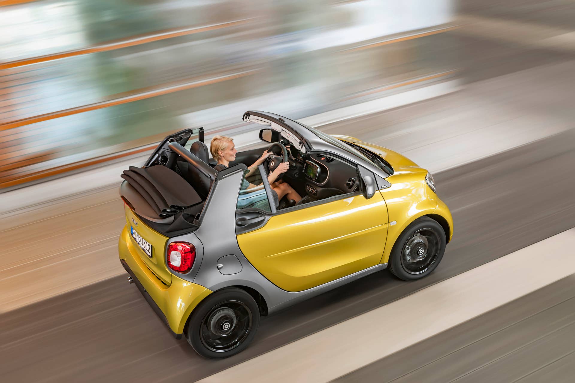 The 2016 Smart Fortwo Cabriolet, overhead rear three-quarter.